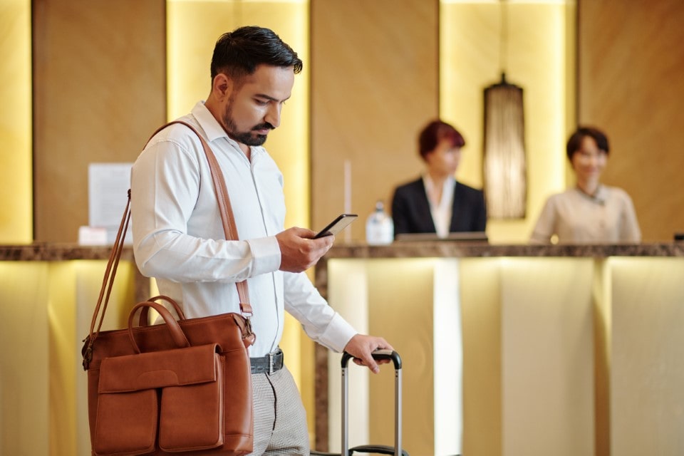 Hotel guest ordering taxi