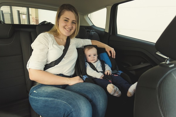 mother and baby boy in car 